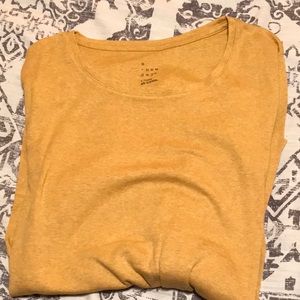 Long sleeve mustard yellow tee.